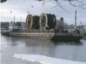 reels on barge with ice